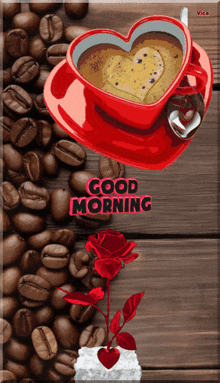 a cup of coffee in a heart shaped cup with the words good morning written on it