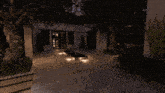 a house with a tree in the middle of the yard