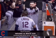 a baseball game between the indians and the white sox is being played in chicago