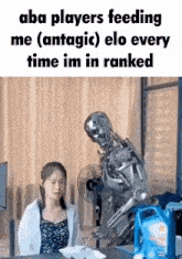 a picture of a robot feeding a woman with the caption " aba players feeding me