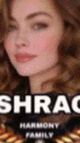 a close up of a woman 's face with the words shrag harmony family