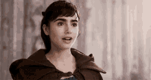 Lily Collins Smiling GIF - Lily Collins Smiling Mirror Mirror GIFs