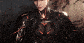 a close up of a man in a futuristic suit with a triangle on his chest