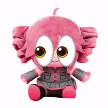 a stuffed doll with pink hair and red eyes is sitting on a table