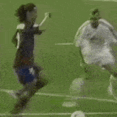 a soccer player with the number 10 on his back is kicking a ball
