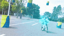a person walking down a street with a yellow sign that says do
