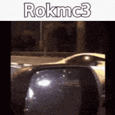 a picture of a car in the rear view mirror with rokmc3 written above it