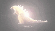 a glowing godzilla is displayed on a dark background