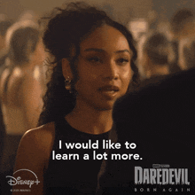 a poster for daredevil born again shows a woman saying i would like to learn a lot more