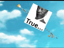 a kite with a picture of a man and the words true