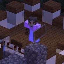 a person holding a shield in a video game with a cross in the corner