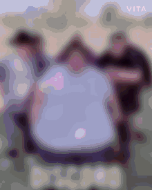 the word vita is on the bottom of a purple background