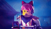 a lego figure with pink hair and cat ears is wearing headphones