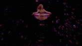 a woman in a bathing suit sits in a glass of liquid