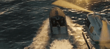 a police helicopter is flying over a boat