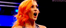 a woman with red hair is making a surprised face .