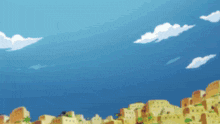 a blue sky with white clouds and a city in the background