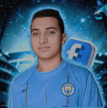 a man wearing a blue manchester city shirt stands in front of a facebook logo