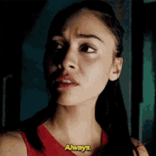 a close up of a woman 's face with the words `` always '' written on it .