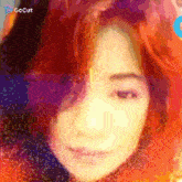 a close up of a woman 's face with the word gocut visible