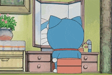 doraemon is looking at himself in a mirror