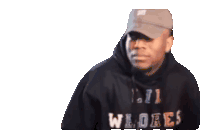 a man wearing a hat and a hoodie that says lil wores