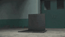 a blue light is coming out of a metal object