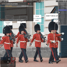 a group of men in red uniforms are marching in front of a building with the words radio communications on the bottom