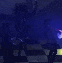 a girl in a school uniform singing into a microphone while two other people dance