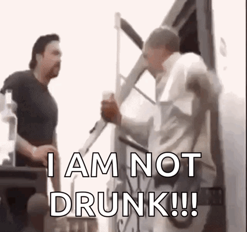 two men are standing next to each other and one of them says i am not drunk !!!