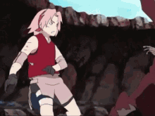 a cartoon girl with pink hair is standing next to a rock .