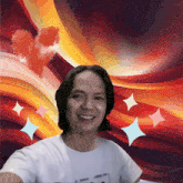 a man is smiling in front of a colorful background with a heart in the middle