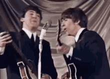 The Beatles George Harrison GIF - The Beatles George Harrison She GIFs