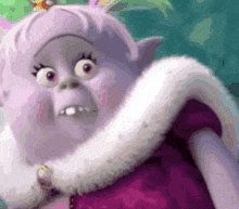 a troll with a crown on her head is wearing a purple dress .