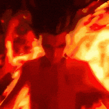 a painting of a person surrounded by flames and smoke