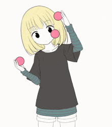 a girl blowing a bubble with a pink ball