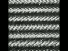 a black and white photo of a rope .
