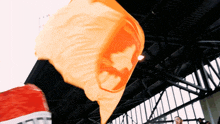 an orange flag with a skull on it