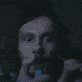 a close up of a person lighting a candle