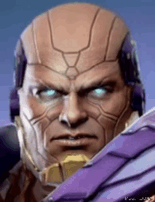 a close up of a man 's face with blue eyes and a purple helmet on .
