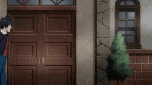 a man and a woman standing in front of a door