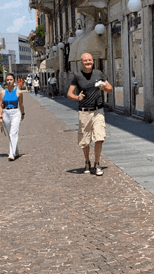 Old Man Running Cannoli GIF - Old Man Running Old Man GIFs