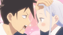 a boy and a girl are touching each other 's foreheads in a cartoon
