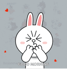 a cartoon bunny holding a red heart with the words good morning written on the bottom