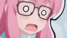 a close up of a girl wearing glasses with a surprised look on her face