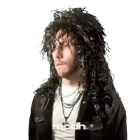 a man wearing a black wig and a black jacket with the word mcdh written on the bottom