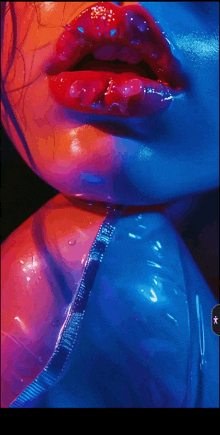 a close up of a woman 's mouth with red lips