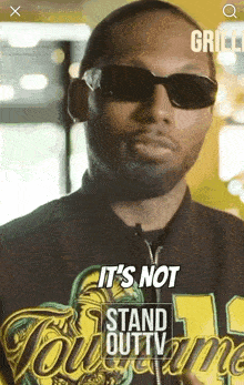 a man wearing sunglasses says it 's not stand out tv .
