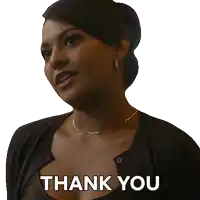 a woman with a thank you sticker on her face