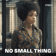 a woman in a paisley shirt says " no small thing "
